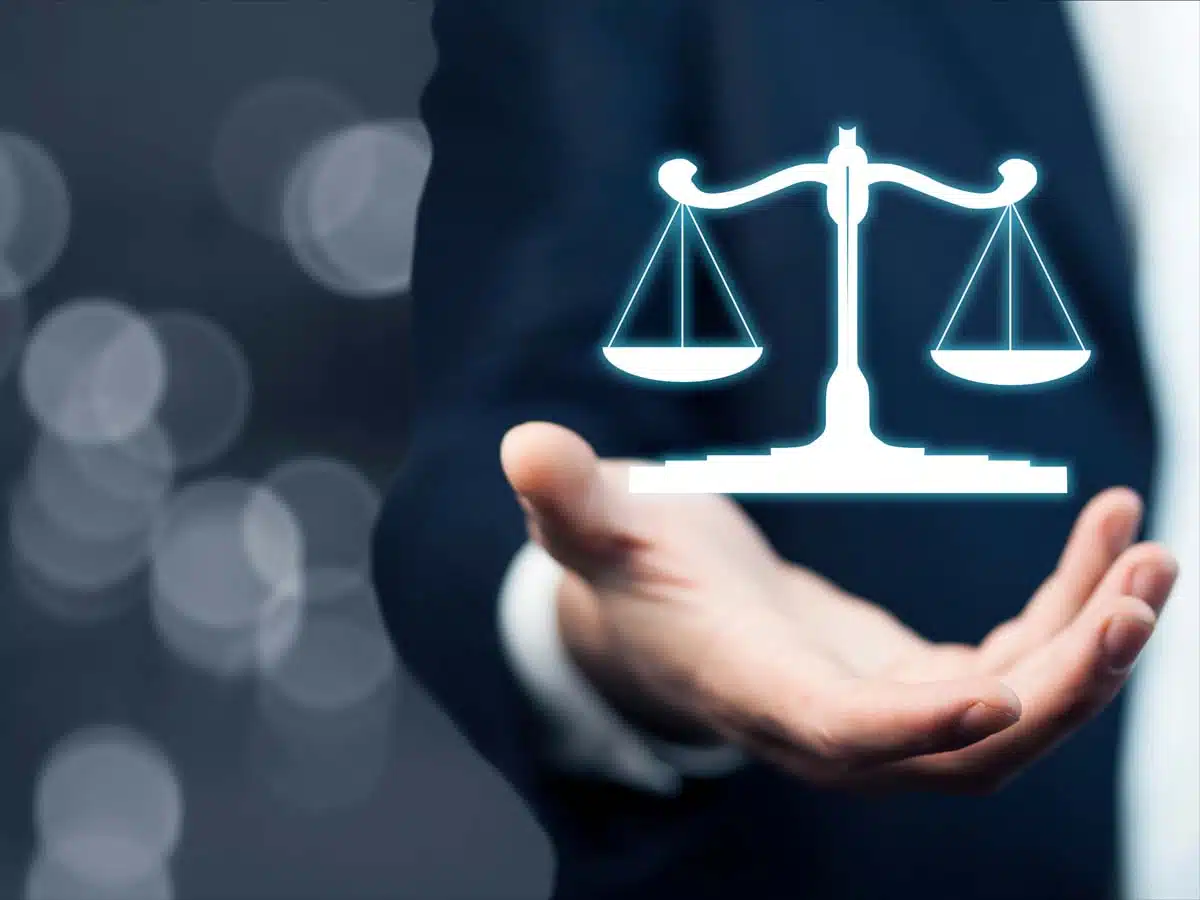 Law concept above the hands of a man in background